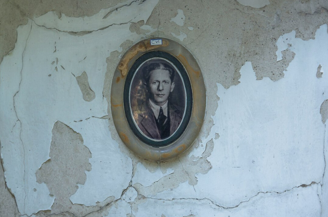 Portrait of a Polish man historian in his forties in a suit
