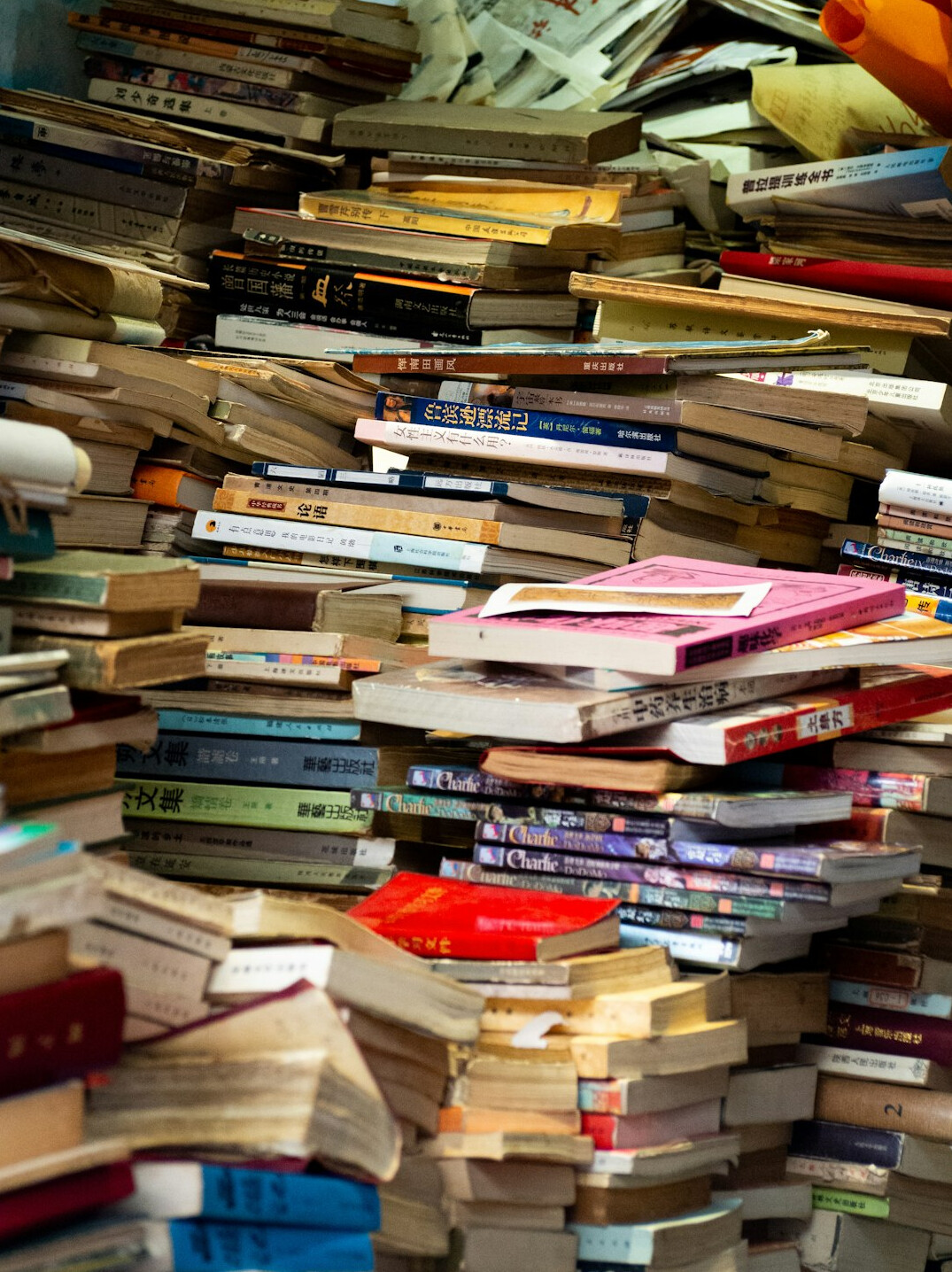 Pile of old hardcover books piled up