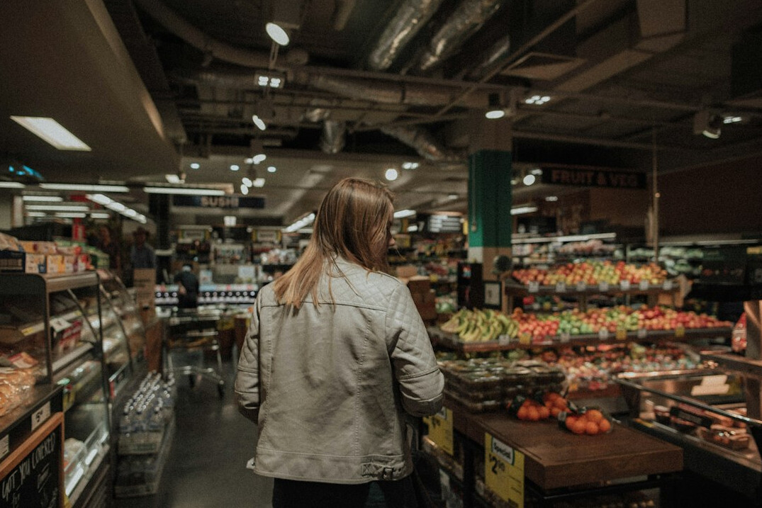 supermarket security guard standing